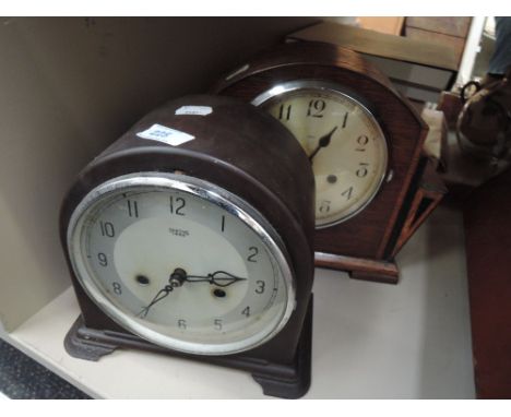 An Enfield art deco style mantle clock and a Smiths Bakelite mantle clock