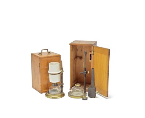 A Collins Brokett microscope bench lamp, English, circa 1900,complete with brass stand, glass reservoir and ceramic chimney i