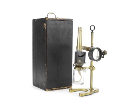 A microscope bench lamp in case,  English, late 19th century,with glass reservoir, brass stand  and condenser, in pine case, 