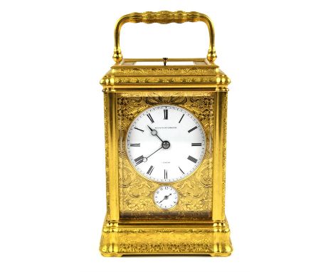 French Carriage clock by Klaftenberger, Geneva, 19th Century. The gorge case and dial plate richly engraved with Rococo decor
