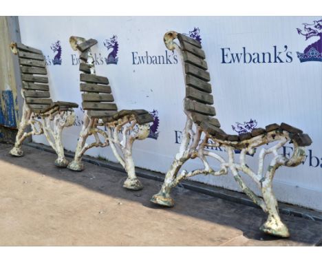 Set of three late 19th century cast iron bench supports with entwined vine design in the manner of Coalbrookdale, each cast i