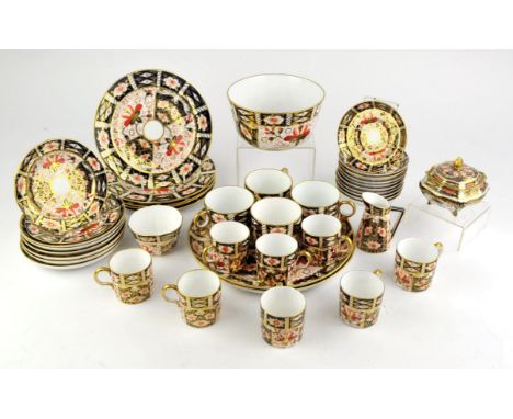 Royal Crown Derby Imari porcelain, a quantity to comprise ten saucers, eight cans, a bowl, five plates, a box and cover, six 