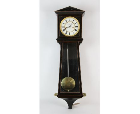  An ebonised wood wall mounted regulator clock by W Blatterbauer, 19th Century, the case of architectural design, the white e