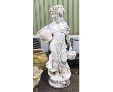 Reconstituted stone figure of a woman holding baskets of fruit, H138cmsCondition Report:  Damages to wrist, light general cra