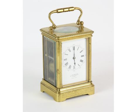 French brass cased carriage clock, retailed by J W Benson, late 19th Century, the white enamel dial with Roman and Arabic num