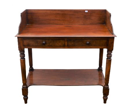 Mahogany side table, 19th century, with three-quarter gallery top, above two drawers, on turned legs joined by a solid shelf,