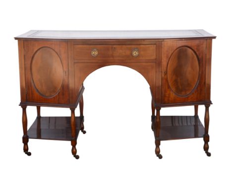 Mahogany writing desk, early 20th century, top with inset tooled leather writing surface above frieze draw, flanked above pan