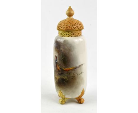 A Royal Worcester vase, early 20th Century, decorated by J. Stinton with a pheasant, the lid and rim with reticulated decorat