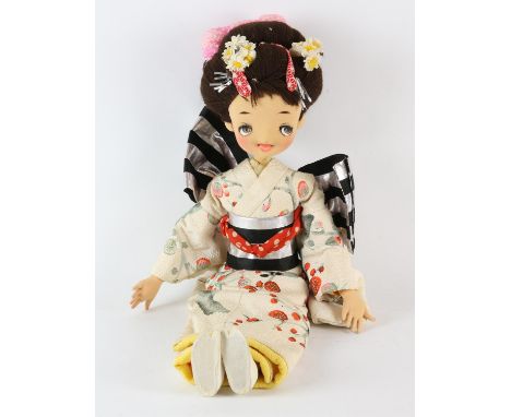 A Lenci type doll, in the form of a Geisha girl, with jointed body, wearing a kimono, 59cm high