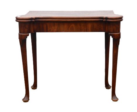 George III mahogany concertina card table, the folding top with green baize lining with candle plates and inset coin wells, o