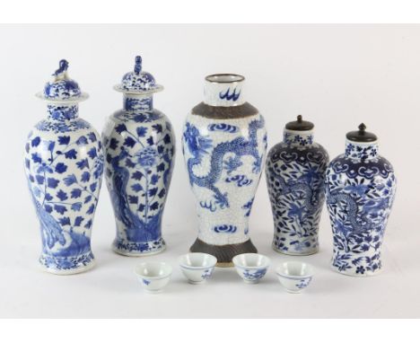 Two pairs of blue and white vases, both pairs with four-character marks of The Kangxi Emperor, but neither pair of the period