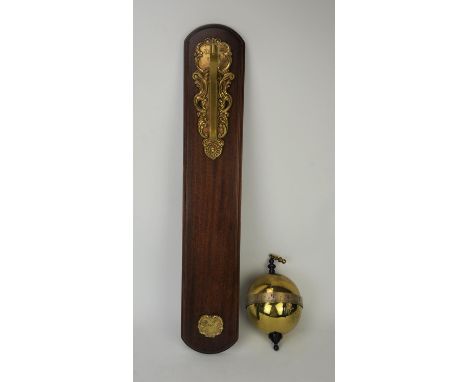 Thwaites and Reed brass gravity clock, with mahogany wall mount, no 390, engraved to base name plate Alan Wood 1972, with a b