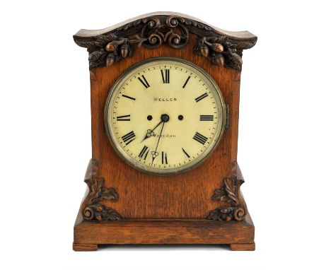 Early 20th century double fuzee chain driven mantle clock striking the hours and half hours on a bell, the white enamel dial 