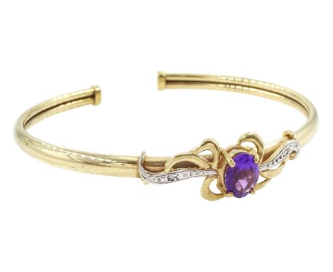 9ct gold amethyst and diamond chip torque bangle, hallmarkedCondition Report:Approx 7.2gm, circumference from end to end = 15
