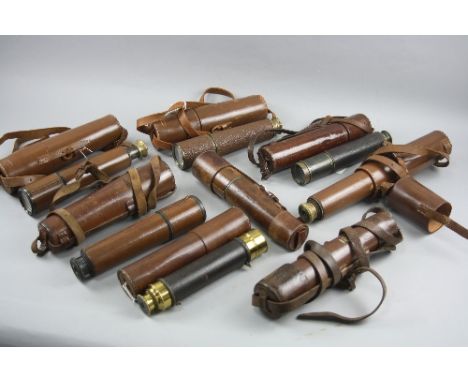 A BOX CONTAINING EIGHT MILITARY STYLE WWI/II ERA TELESCOPES, all are housed in leather cases, 1 x TEL SCT REGT II's KEC 1942,
