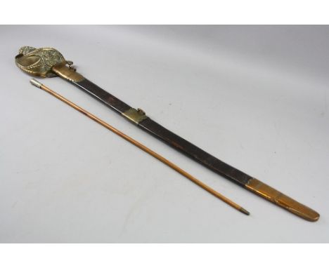 A NAVAL PATTERN OFFICERS DRESS SWORD, large grip with hinged extra protection Lions Head, brass and leather scabbard, the bla