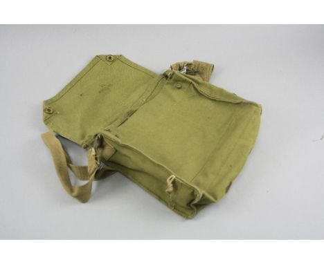A BRITISH WWII CANVAS SHOULDER BAG, approximately 28cm x 25cm x 8cm, marked on the inside flap, with the issue arrow head and