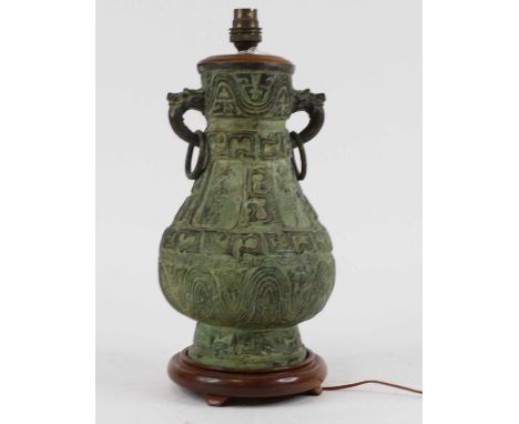 A Chinese verdigris metal table lamp, of archaic form, h.38cm 