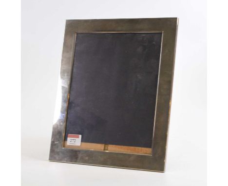 An Elizabeth II silver clad easel photograph frame of rectangular shape, height 29cm
