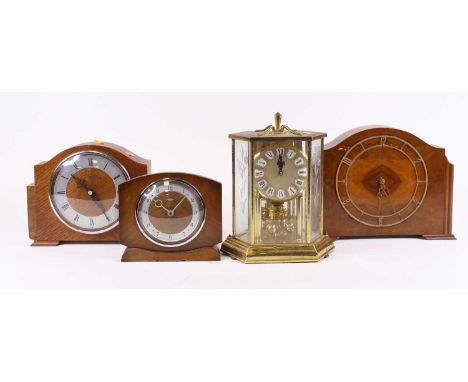 An early 20th century walnut cased mantel clock, height 21.5cm together with three others similar