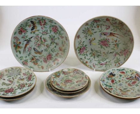 A collection of 19th century Chinese Canton plates, each enamel decorated with birds, flowers and insects, largest dia. 25.5c