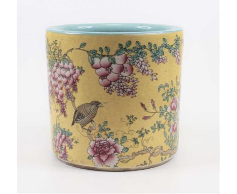 A Chinese porcelain brush pot, enamel decorated with flowers upon yellow ground, height 19cmVery good condition.