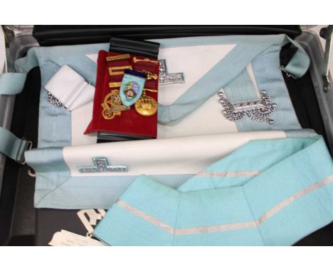 A collection of Masonic regalia, to include a silver-gilt and enamelled jewel for the Ravensbourne Chapter, silver set square