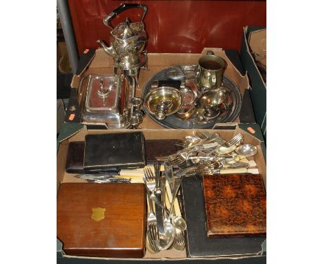 A collection of silver plated items to include an Edwardian spirit kettle on stand, loose flatware, twin handled trophy, and 