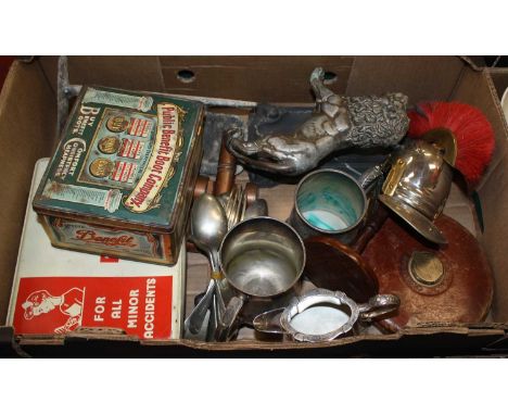 Two boxes of miscellaneous items to include pewter tankards, silver plated flatware, and a metal model of a lion
