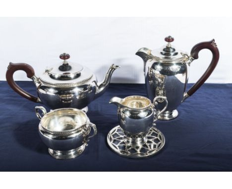 A four piece silver tea service Birmingham 1932, makers mark for Fenton Russell & Co Ltd, 57t oz together with a silver and g