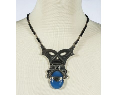 A large silver and blue tribal Tuareg necklace handmade from Niger