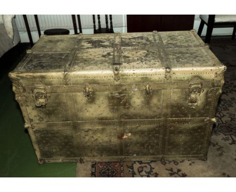 A large leather and brass bound travel trunk American makers name, James S Topham Washington