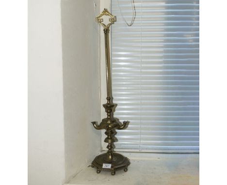 An Indian brass oil lamp