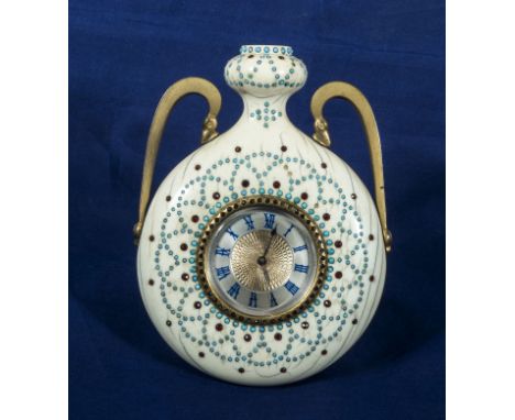 Ivory enamel and paste gem set clock with silvered and metal dial by Howell James & Co