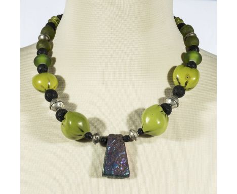 Unique designer necklace, recycled African glass , lava rock dried seeds and titanium quartz                                 