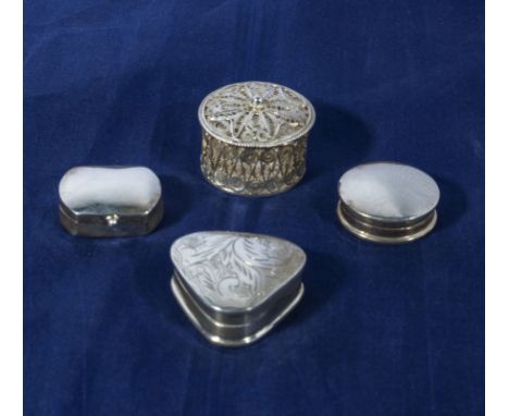 Four silver pill boxes