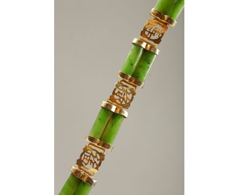 A CHINESE JADE BANGLE.