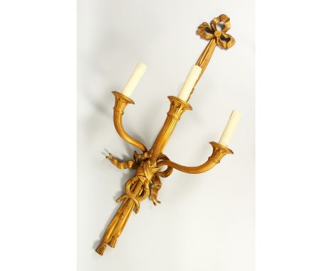 A LARGE SET OF FIVE THREE LIGHT WALL SCONCES, with curving trumpets and ribbon motifs. 114cms long.