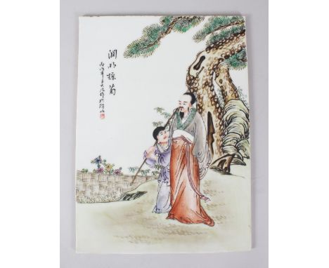 AN EARLY 20TH CENTURY CHINESE PORCELAIN PANEL, painted with figures and calligraphy. 35cms x 26cms.