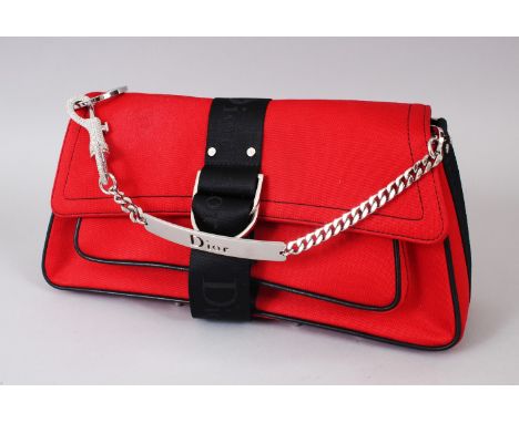 A VERY GOOD CHRISTIAN DIOR RED AND BLACK BAG, with chrome handle, in original box.