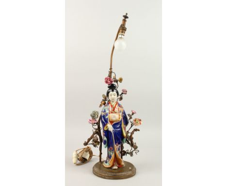 A FRENCH TABLE LAMP, as a Japanese porcelain Geisha, with metal branches and flower head. 34cms high.
