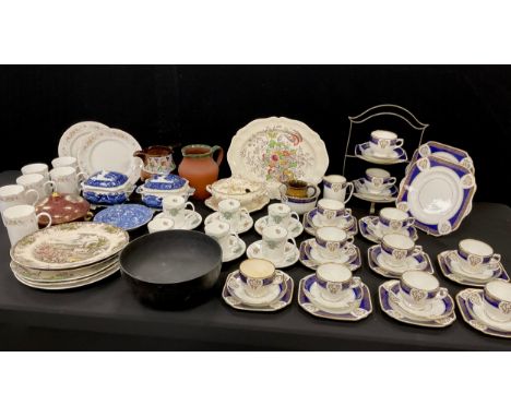 A 19th century Wedgwood black basalt fruit bowl, 23cm diameter;  two Copleands Tower pattern sauce tureens and covers;  Wedgw