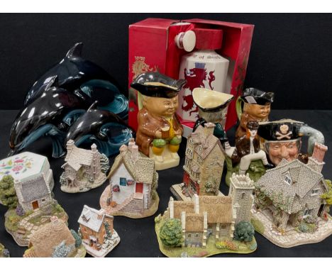 A Poole pottery leaping Dolphin, others, Lilliput lane cottages, Royal Doulton character jug, etc, qty.
