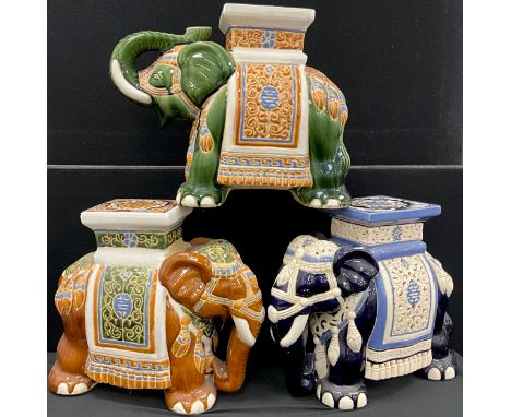 A Chinese glazed ceramic elephant stool / garden seat, in green, ochre, and blue sancai type palette, 41.5cm high;  another t