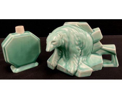 A Spode Royal Jade glaze figural polar bear candlestick, 10cm high, conforming scent bottle, 10cm high, c.1930, (2).