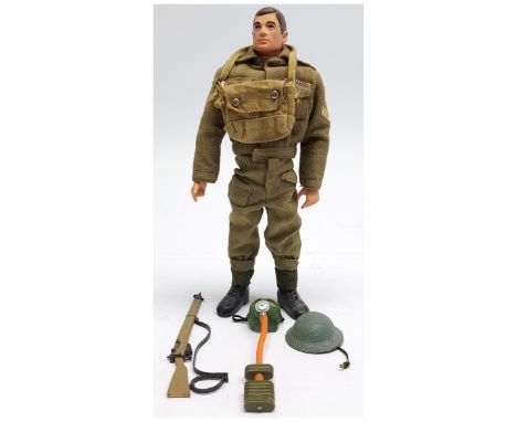 Palitoy Action Man vintage British Infantryman, painted head, plastic hands, wearing tunic, trousers, gaiters, helmet, plus o