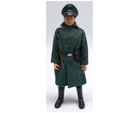 Palitoy Action Man vintage Camp Kommandant, dark flock hair, plastic hands, wearing greatcoat, jackboots, cap, luger, plus ot