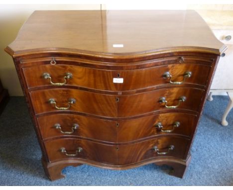 A 19th century mahogany serpentine fronted chest, with moulded edged top, brushing slide and four long graduated cock-beaded 