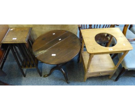 A Georgian oak tilt-top tripod table, 56cm diameter, a stripped pine two-tier washstand and an oak two-tier plantstand (3)