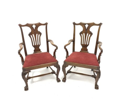  Pair of 19th century Chippendale style library elbow chairs, with ribbon carved cresting rail and pierced splats, swept open